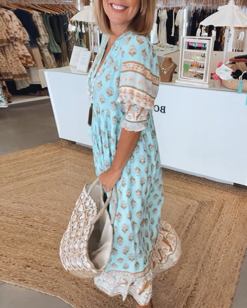 MANA | ROBE MIDI FLORALE ÉLÉGANTE AVEC ENCOLURE EN V