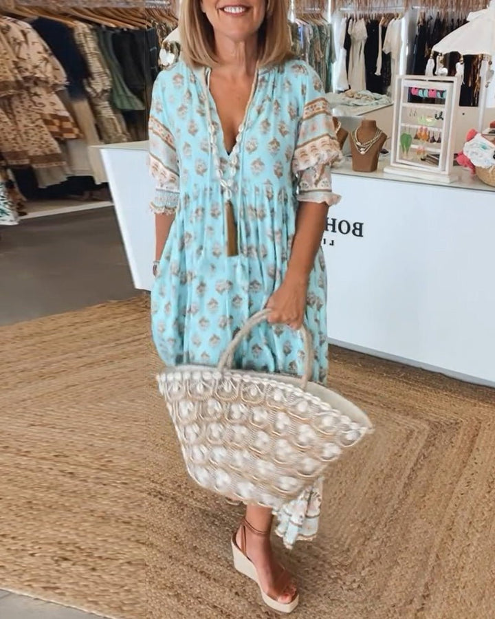 MANA | ROBE MIDI FLORALE ÉLÉGANTE AVEC ENCOLURE EN V