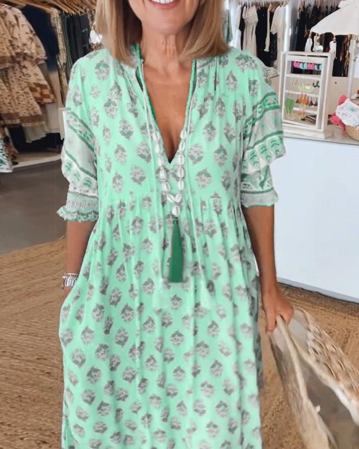 MANA | ROBE MIDI FLORALE ÉLÉGANTE AVEC ENCOLURE EN V