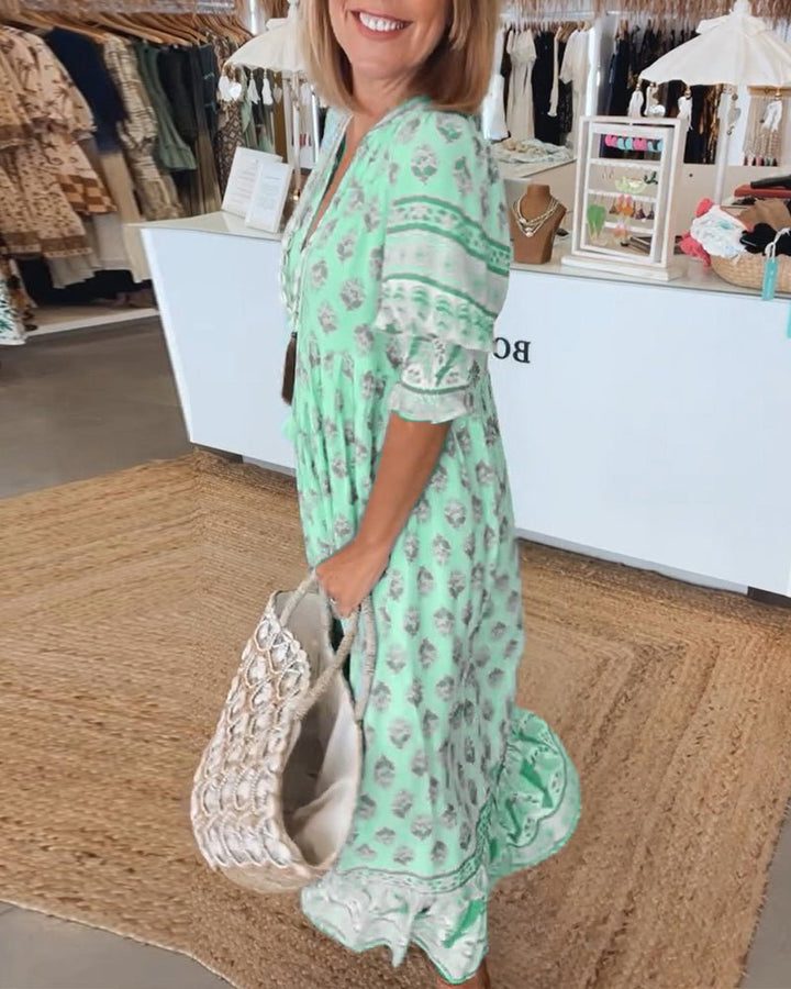 MANA | ROBE MIDI FLORALE ÉLÉGANTE AVEC ENCOLURE EN V