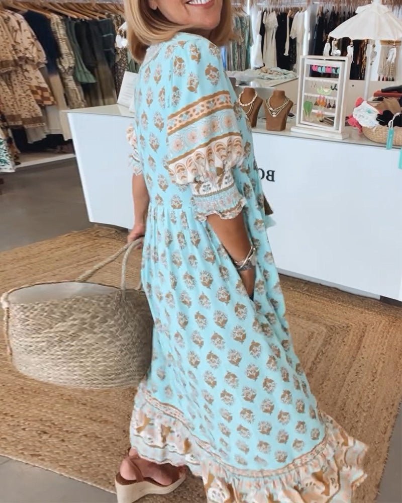 MANA | ROBE MIDI FLORALE ÉLÉGANTE AVEC ENCOLURE EN V