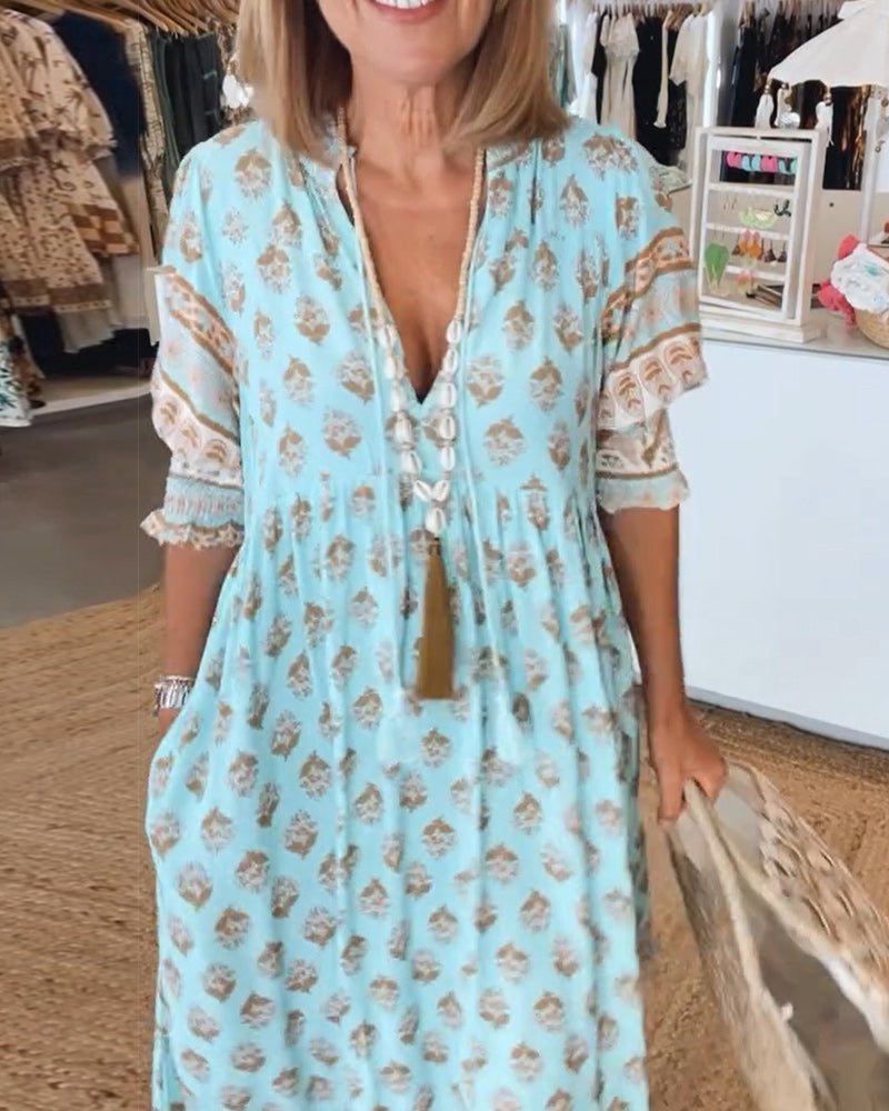MANA | ROBE MIDI FLORALE ÉLÉGANTE AVEC ENCOLURE EN V